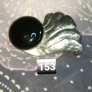 STERLING SILVER AND BLACK ONYX BROOCH